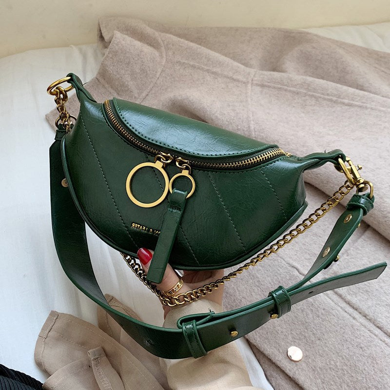 “Rivoli” -  Le sac simili cuir bandoulière, semi banane