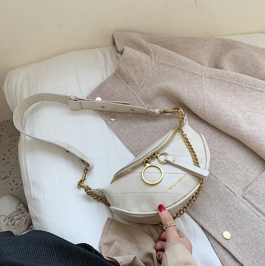 “Rivoli” -  Le sac simili cuir bandoulière, semi banane